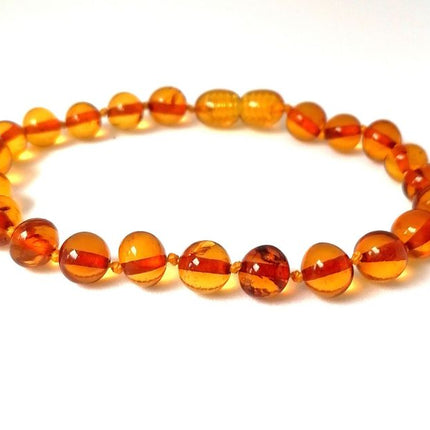 Pulsera de Ámbar adulto
Medidas: entre 18 y 19cm COGNAC PULIDO