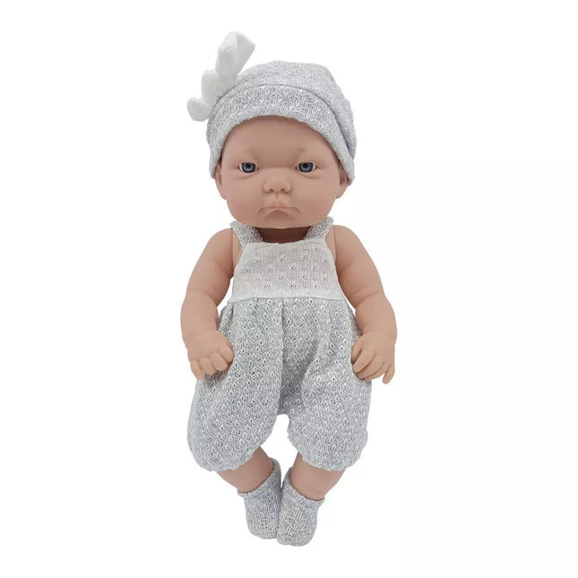 Muñeca recién nacida de 30 cm con cuerpo de vinilo. Incluye sonajero y chupete.