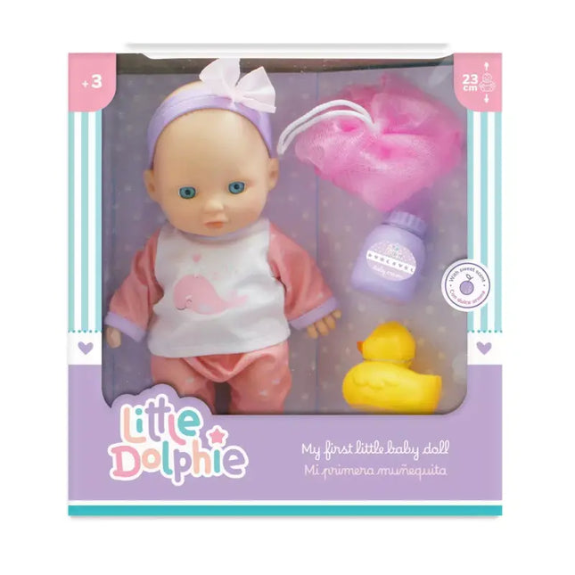 Muñeca de 23 cm , extremidades de vinilo y perfume suave. Incluye esponja, contenedor morado y patito de silicona.