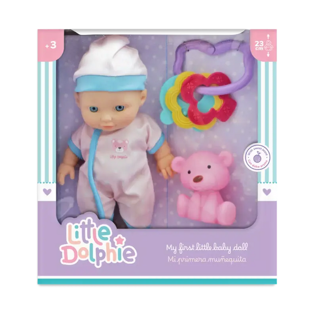 Muñeca de 23 cm , extremidades de vinilo y aroma suave. Incluye juguete de silicona y sonajero.